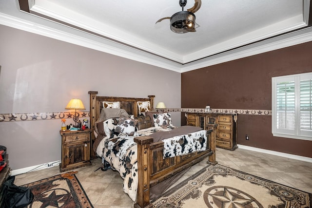 bedroom with light tile patterned floors, a raised ceiling, and ornamental molding