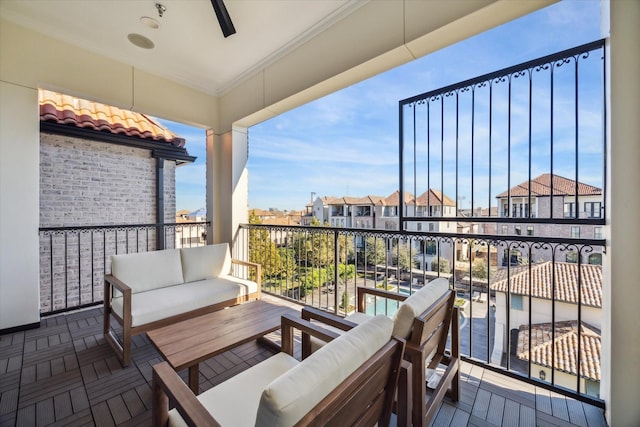 balcony featuring outdoor lounge area and ceiling fan