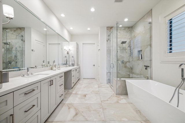 bathroom featuring shower with separate bathtub and vanity