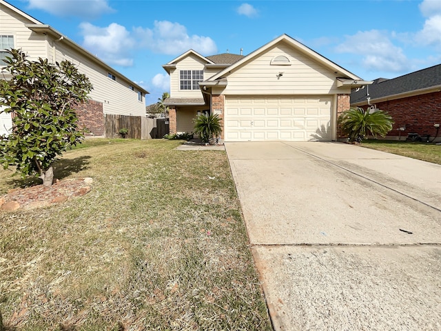 view of front property featuring a garage and a front yard