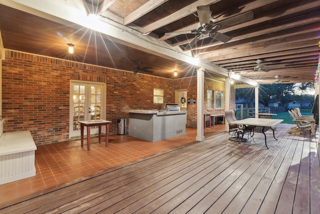 deck with an outdoor kitchen