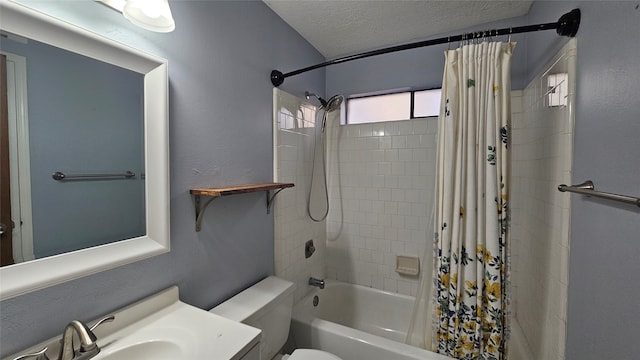 full bathroom with vanity, shower / bath combination with curtain, a textured ceiling, and toilet