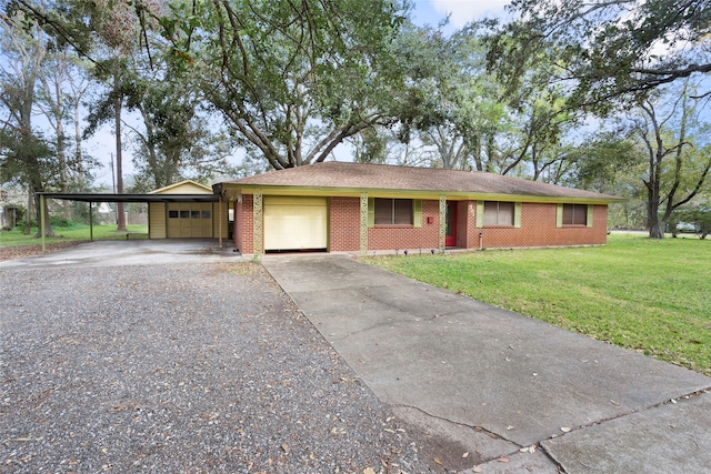 ranch-style home with a garage, a front yard, and a carport