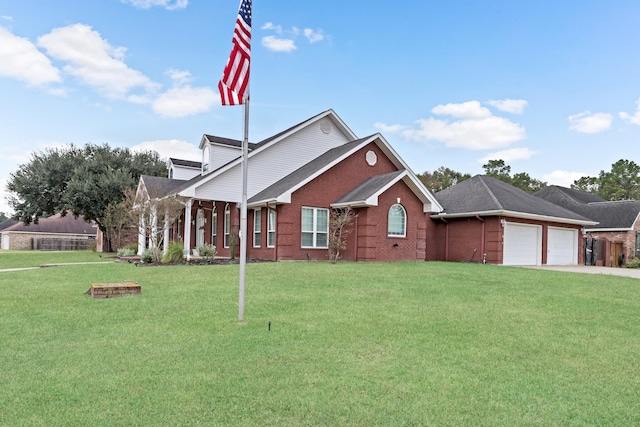 view of front facade featuring a front yard and a garage