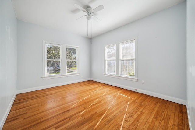 unfurnished room with light hardwood / wood-style floors and ceiling fan