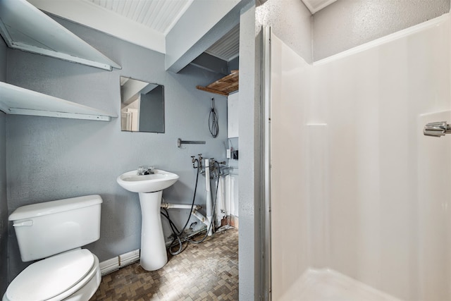 bathroom with toilet and sink