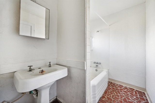 bathroom featuring shower / tub combination