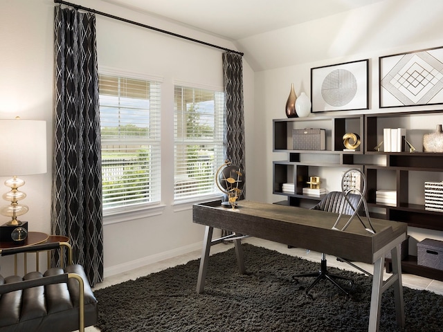 office featuring lofted ceiling