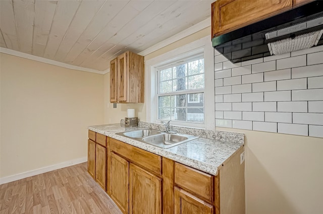 kitchen with wood ceiling, crown molding, exhaust hood, sink, and light hardwood / wood-style flooring