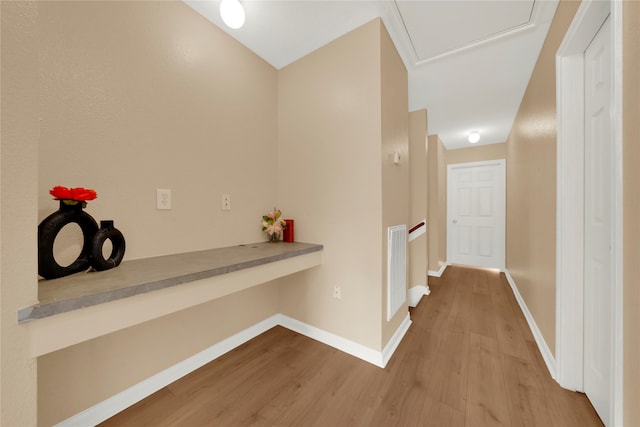 hallway featuring hardwood / wood-style floors