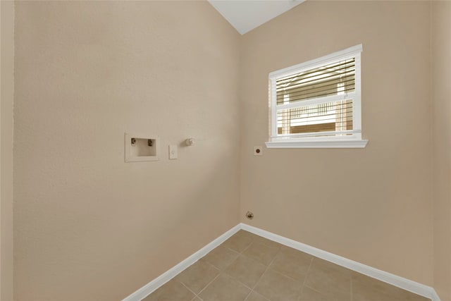 laundry area featuring washer hookup, light tile patterned floors, gas dryer hookup, and electric dryer hookup