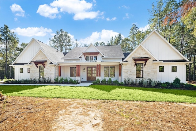 modern inspired farmhouse with french doors and a front lawn