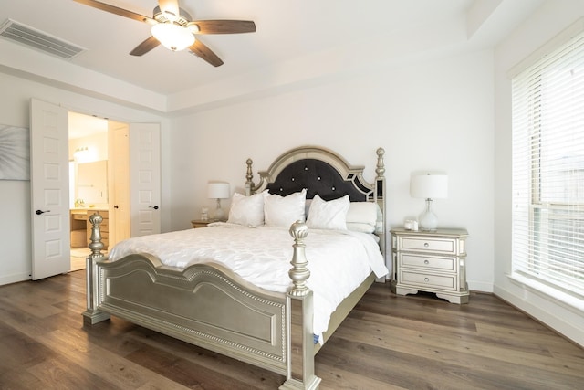 bedroom featuring ceiling fan and dark hardwood / wood-style floors