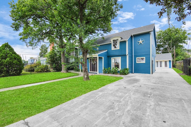 view of front of property with a front lawn