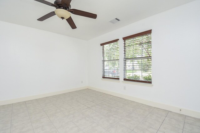 unfurnished room featuring ceiling fan