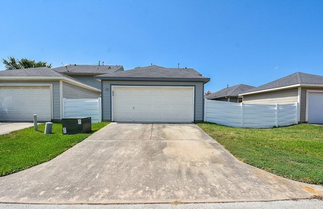 garage with a yard