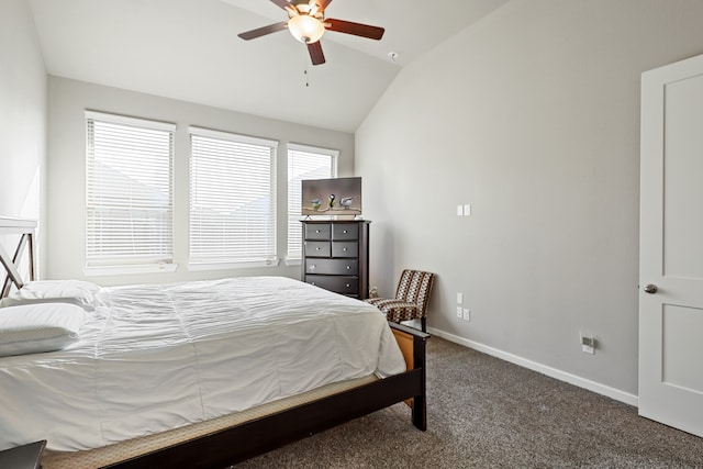 bedroom with ceiling fan, lofted ceiling, and carpet floors