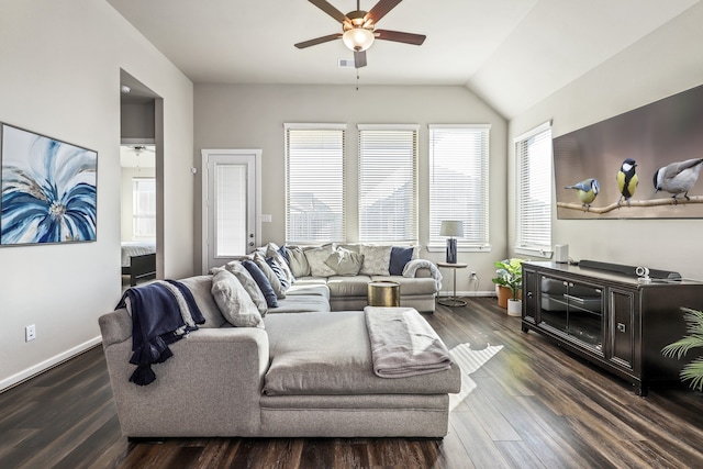 living room with ceiling fan, dark hardwood / wood-style flooring, and lofted ceiling