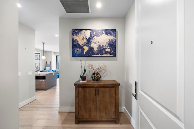 hall featuring light wood-type flooring