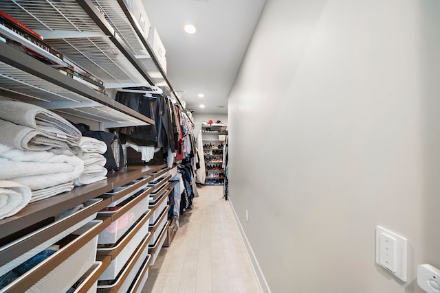 walk in closet featuring light wood-type flooring