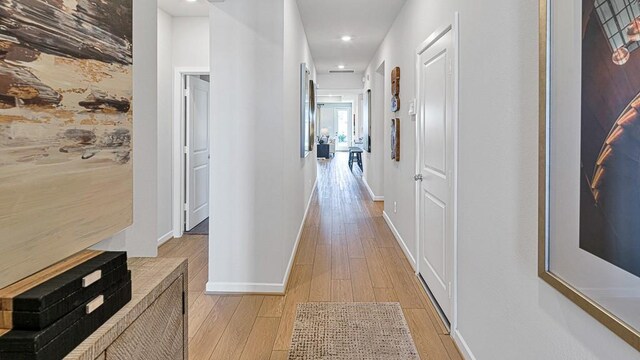 corridor featuring light wood-type flooring