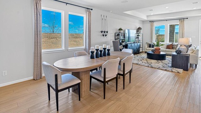 dining room featuring light wood-type flooring