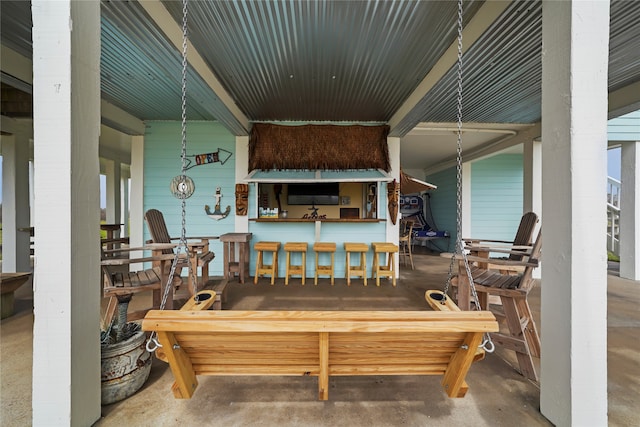 view of patio featuring a bar