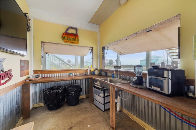 interior space with sink and concrete flooring