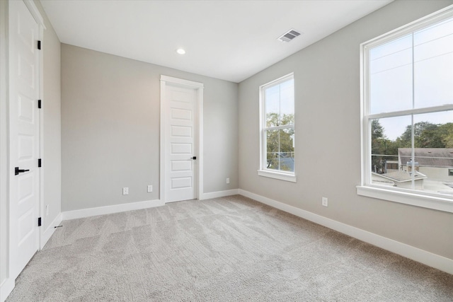 empty room with light carpet