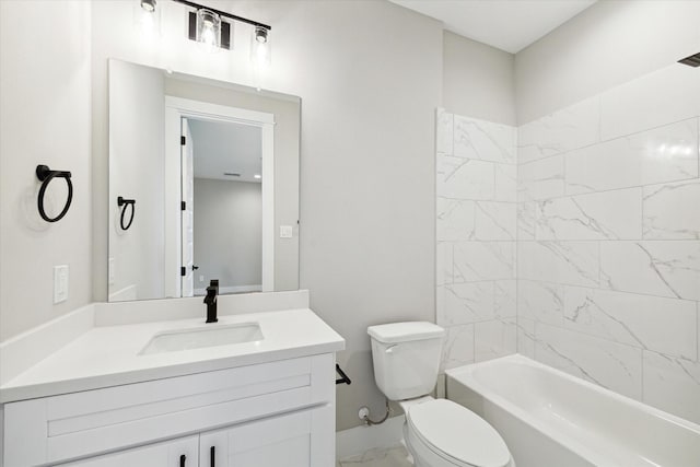 full bathroom featuring vanity, toilet, and tiled shower / bath combo