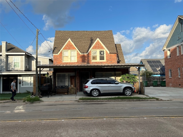 view of front of home featuring a carport