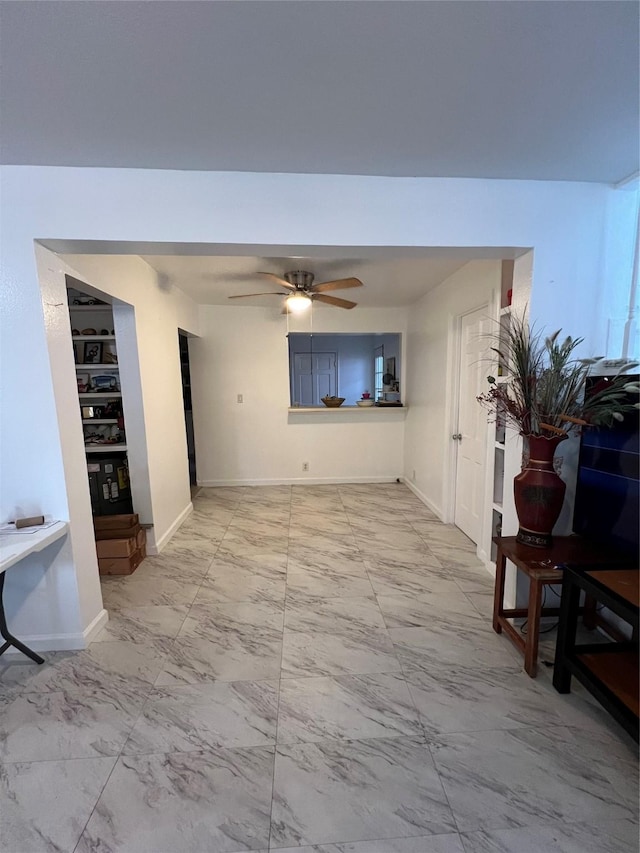 1411 Wheeler St, Houston, TX 77004 - living area with marble look tiles and a ceiling fan