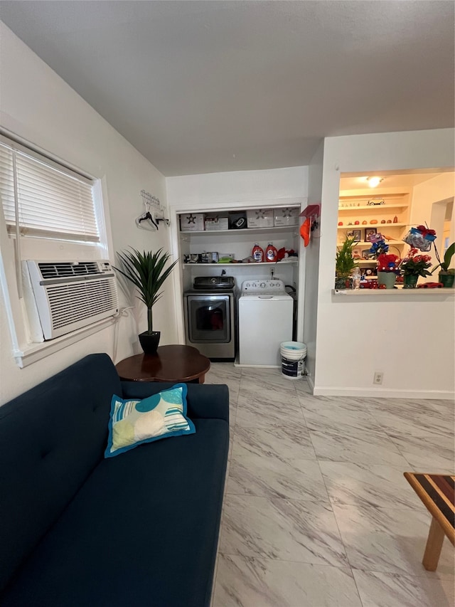 living room featuring cooling unit and washing machine and dryer