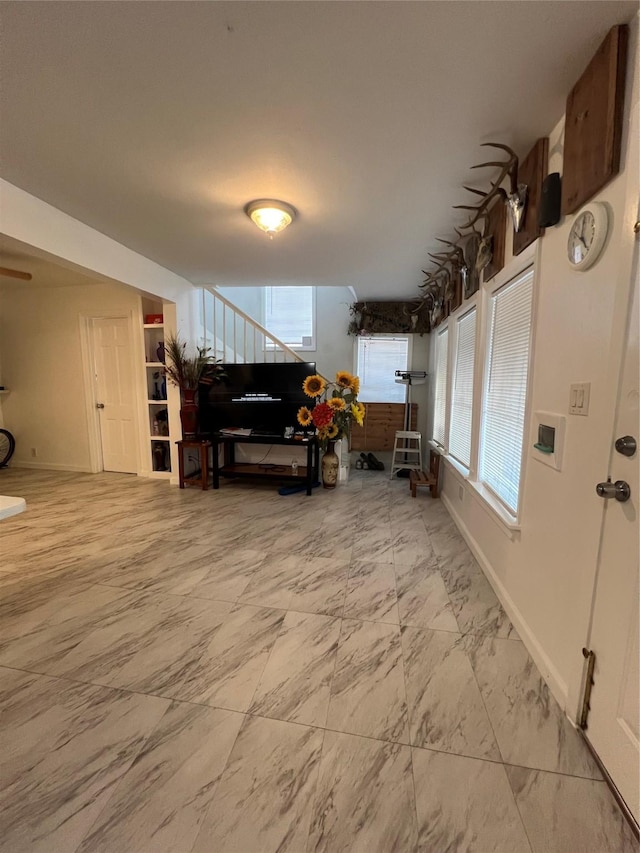 1411 Wheeler St, Houston, TX 77004 - sitting room with plenty of natural light and marble look tile flooring