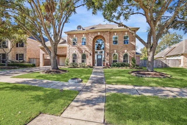 view of front of home with a front lawn