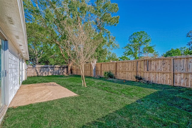 view of yard with a patio area