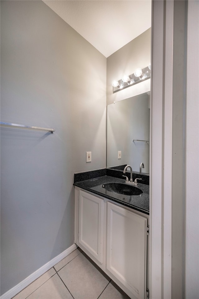 bathroom featuring tile patterned floors and vanity