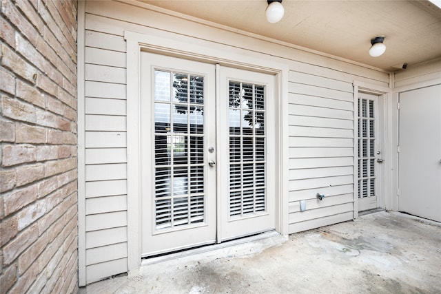 property entrance with french doors and a patio