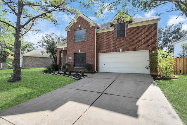 view of front property with a front lawn and a garage