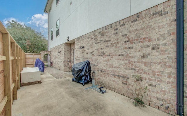 view of home's exterior featuring a patio