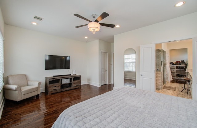 bedroom with ceiling fan and dark wood-type flooring