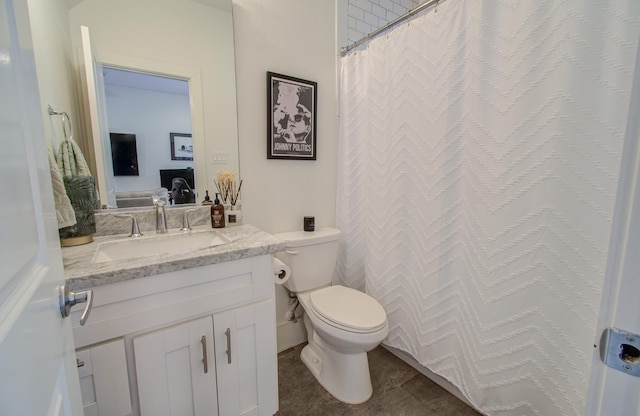 bathroom with vanity and toilet