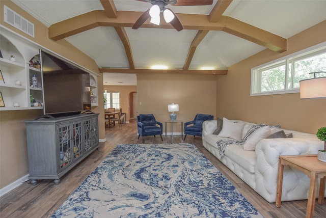 living room with hardwood / wood-style flooring, lofted ceiling with beams, and ceiling fan