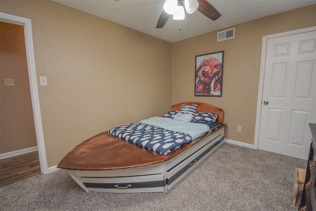 bedroom featuring ceiling fan and carpet floors