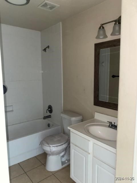 full bathroom featuring tile patterned floors, vanity, shower / bathtub combination, and toilet