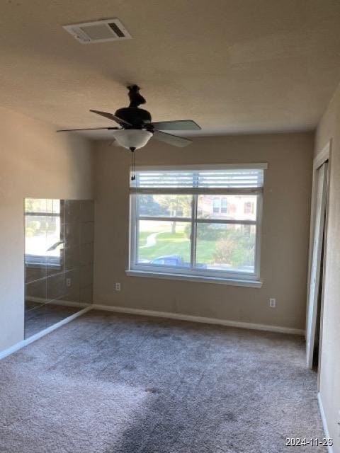 2102 Short Path Ct, Spring, TX 77373 - empty room featuring carpet flooring, a ceiling fan, and baseboards