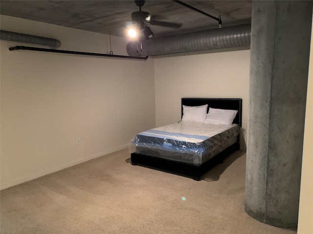 bedroom featuring ceiling fan and carpet floors