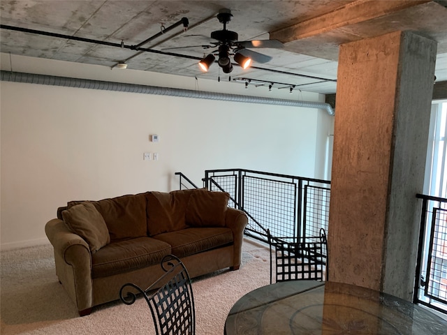 living room featuring ceiling fan and light colored carpet