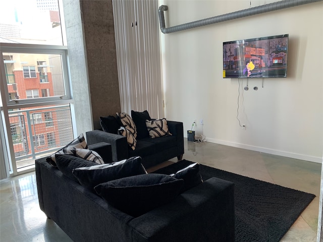 living room with concrete floors