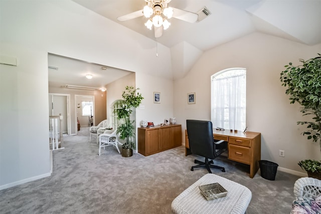 office area with carpet, a healthy amount of sunlight, and lofted ceiling